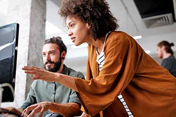 female manager at a computer