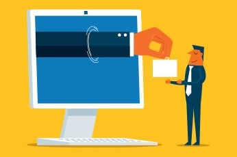 Giant hand emerging from computer screen handing business card to businessman