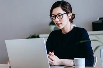 female student at laptop