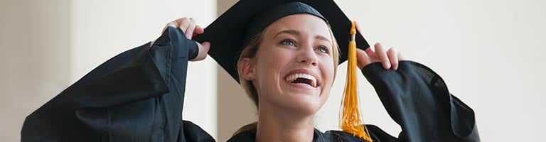 A young woman celebrating her convocation.
