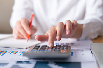 person using a calculator