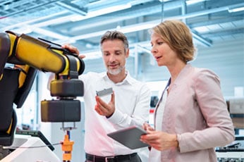 Machine Learning specialists analyze data from AI enabled robots and technology