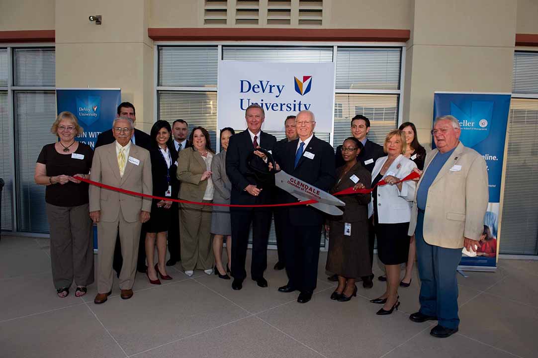 Elaine Scruggs, Steven Frate, DeVry administrators and other leaders perform ribbon cutting at new DeVry campus
