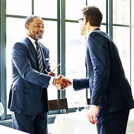 two professionals shaking hands