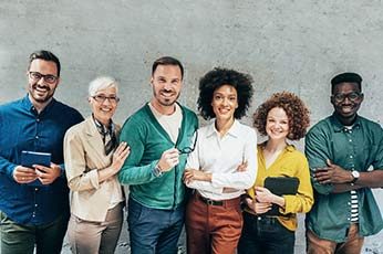 diverse group of coworkers standing together
