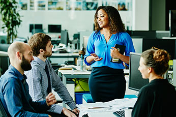 diverse coworkers discuss business