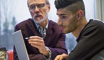 Student listening in college classroom